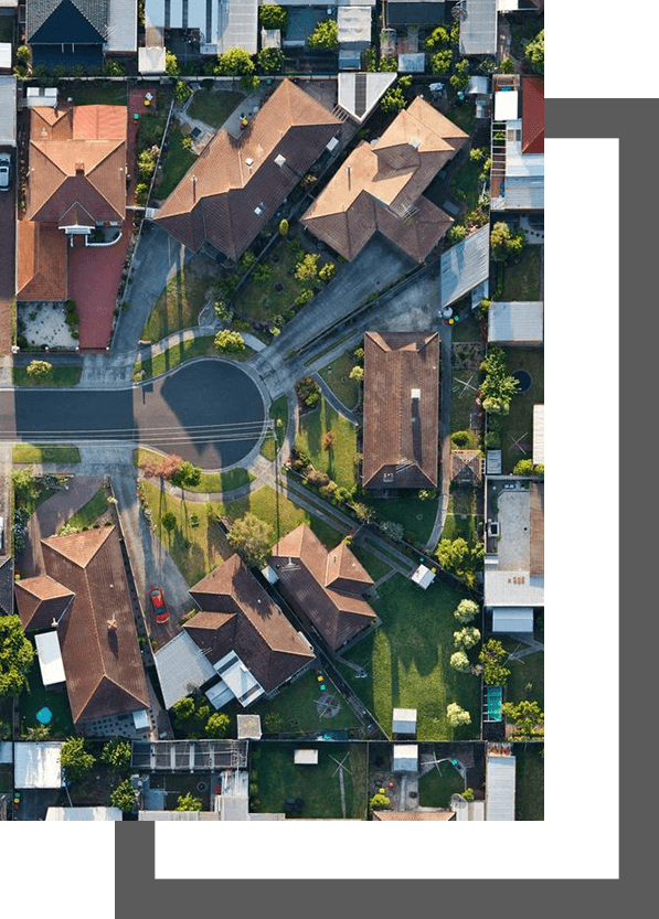 A bird 's eye view of houses and streets.